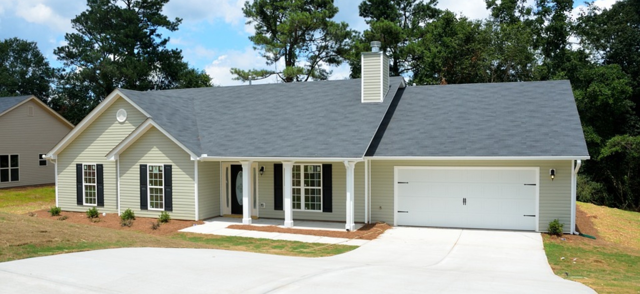 A ranch house with an attached garage