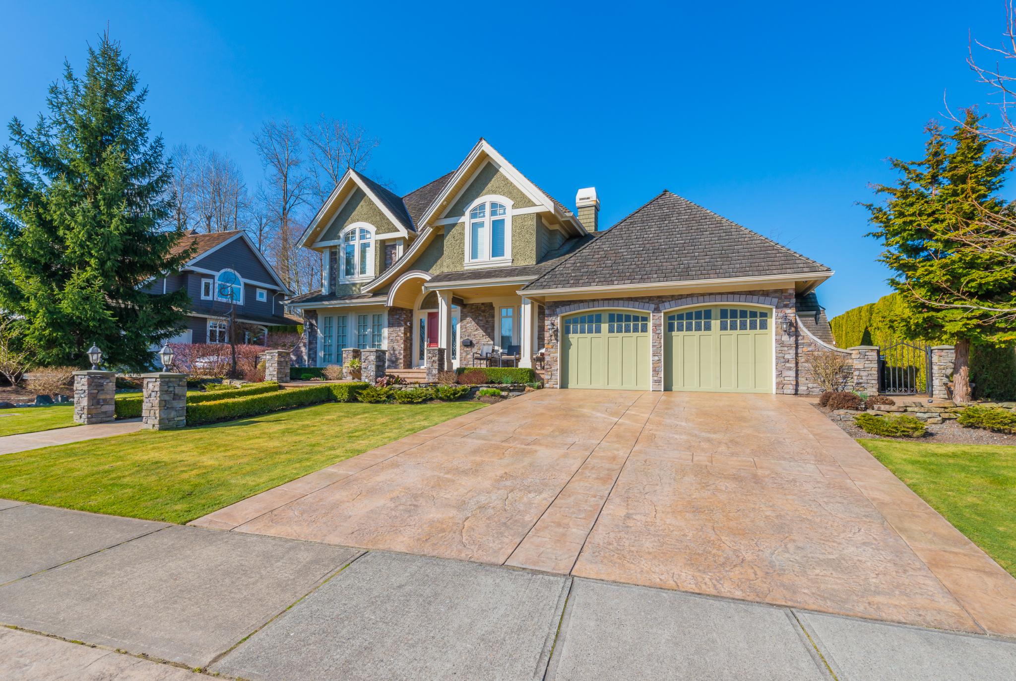 Front view of a suburban home with an attached garage