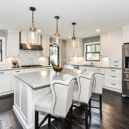 An all-white remodeled Northern Virginia kitchen with an island